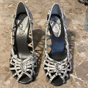 Gently used women’s skinny wedge black and white shoes